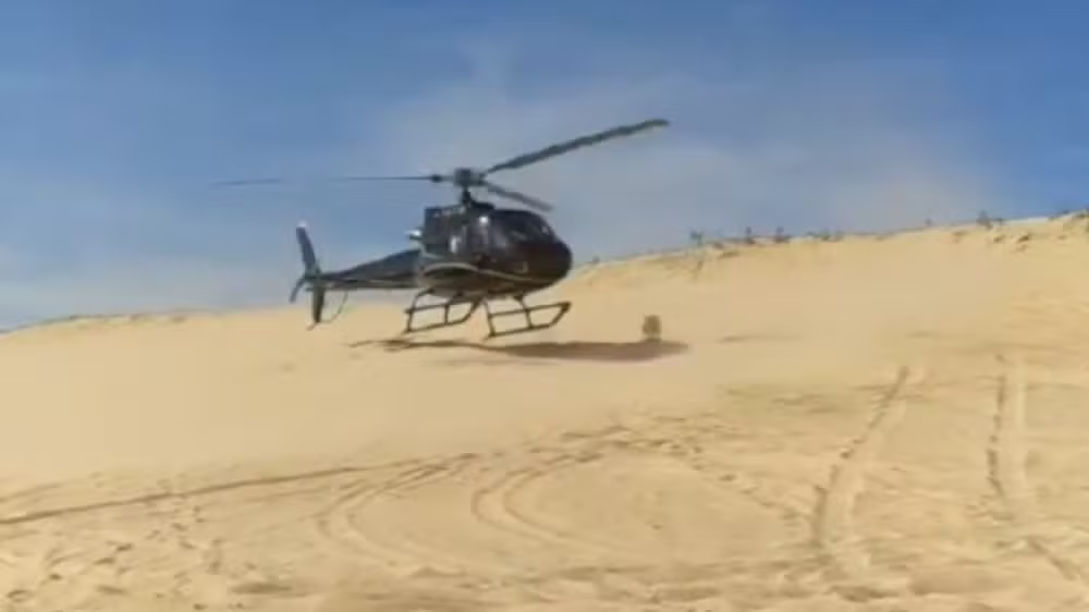 6BARRA8 ACRE Empresário pousa helicóptero em praia no Ceará para comprar piaba frita, e vídeo viraliza